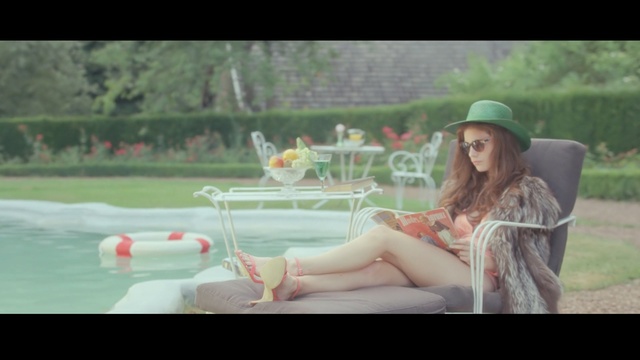 Video Reference: photograph, water, beauty, leisure, fun, girl, sitting, snapshot, photography, vacation, Person