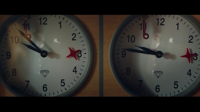 Video Reference: Clock, Red, Home accessories, Gauge, Close-up, Still life photography, Number, Font, Darkness, Photography