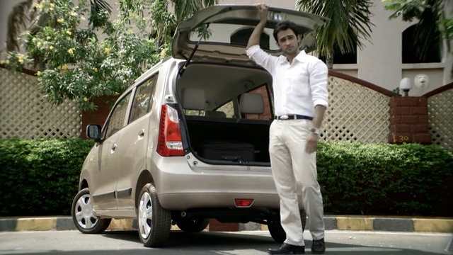 Video Reference: Land vehicle, Vehicle, Car, Motor vehicle, Suzuki wagon r, Mode of transport, Hatchback, Suzuki, City car, Minivan, Person