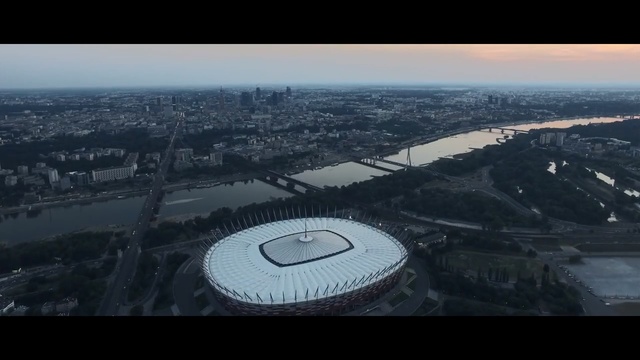 Video Reference: Aerial photography, Bird-eye view, Sport venue, Stadium, Arena, Urban area, Metropolitan area, City, Urban design, Sky