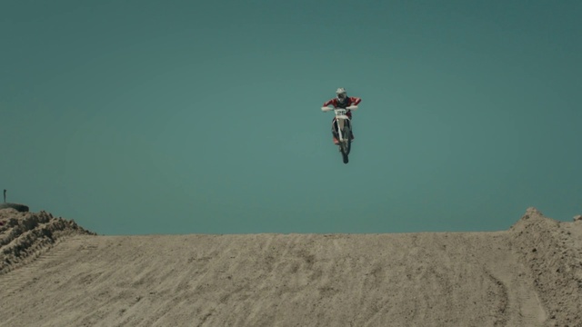Video Reference: Freestyle motocross, Extreme sport, Motocross, Racing, Bicycle motocross, Flip (acrobatic), Sports, Vehicle, Soil, Sand
