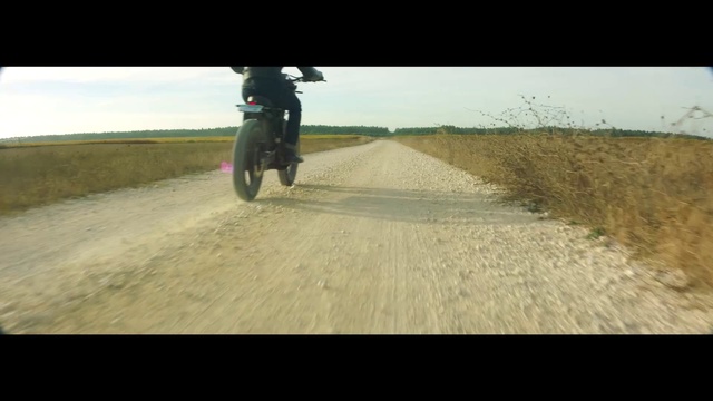 Video Reference: Sky, Tire, Automotive tire, Wheel, Cloud, Vehicle, Asphalt, Road surface, Grass, Rolling