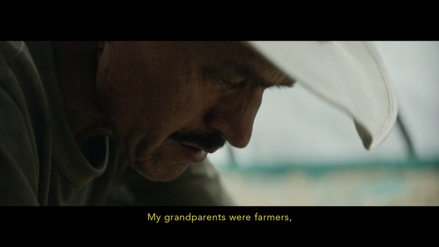 Video Reference: face, person, nose, screenshot, human, mouth, darkness, smile, ear, scene