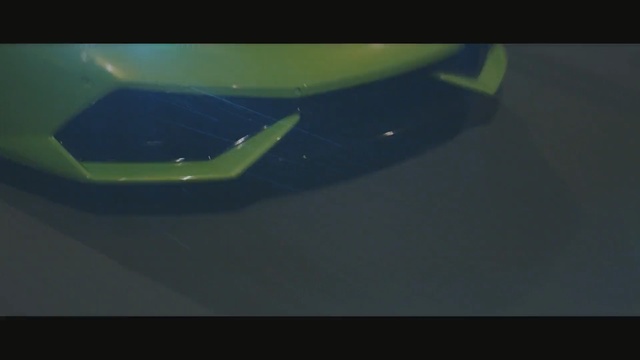 Video Reference: Green, Blue, Automotive design, Automotive exterior, Light, Yellow, Vehicle door, Automotive lighting, Bumper, Macro photography