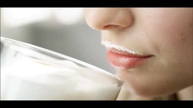 Video Reference: Face, Lip, Nose, Skin, Chin, Cheek, Facial expression, Close-up, Beauty, Head, Indoor, Looking, Food, Teeth, Woman, White, Toothbrush, Brushing, Wearing, Girl, Man, Using, Young, Holding, Black, Close, Mirror, Brush, Standing, Person, Human face, Lipstick, Eyebrow, Eyelash, Portrait