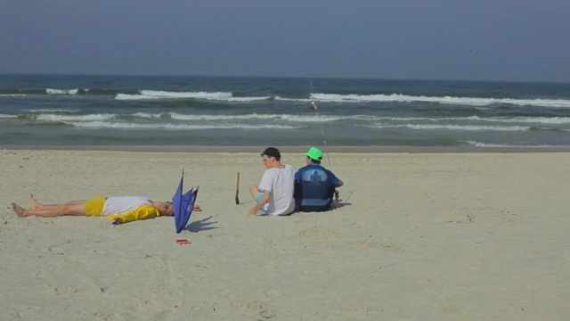 Video Reference: Beach, Sand, Shore, Coast, Vacation, Fun, Ocean, Sea, Tourism, Coastal and oceanic landforms, Person