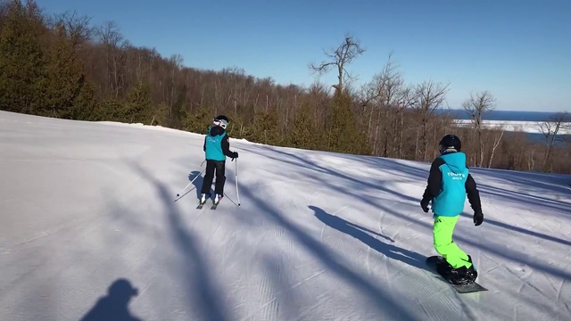 Video Reference: Snow, Winter, Recreation, Footwear, Ice, Sports equipment, Sky, Fun, Tree, Snowshoe