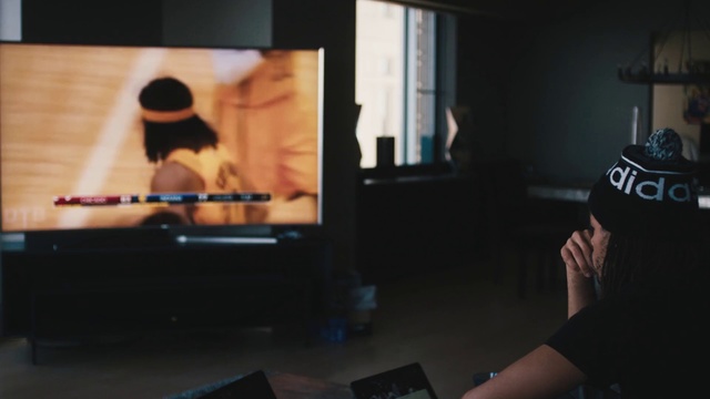 Video Reference: Room, Technology, Electronic device, Photography, Media, Display device, Visual arts, Television, Person
