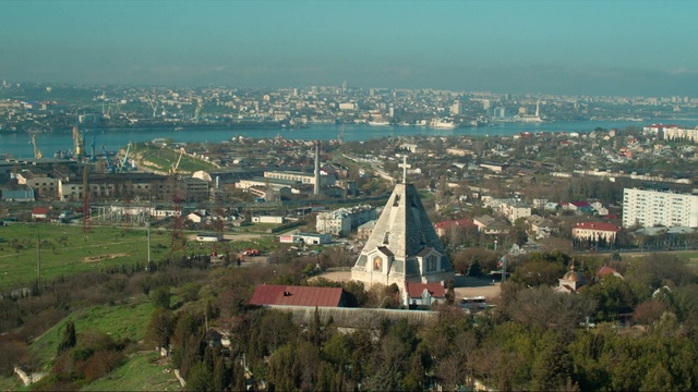 Video Reference: Urban area, Metropolitan area, Aerial photography, Birds-eye view, City, Suburb, Residential area, Cityscape, Human settlement, Landmark