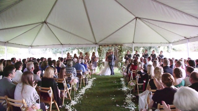 Video Reference: ceremony, event, wedding, crowd, tradition, tent, aisle, function hall, bride, festival