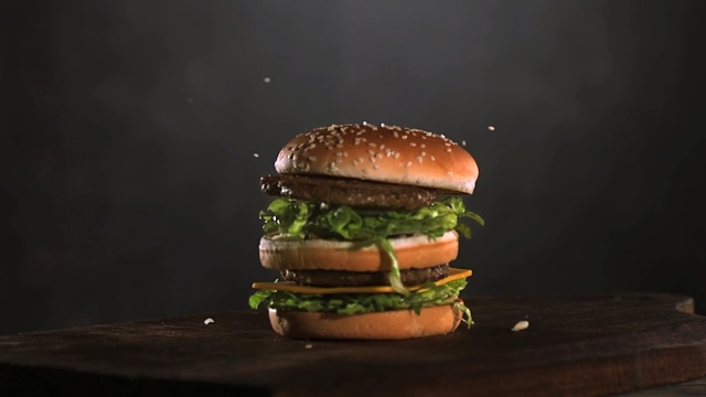Video Reference: hamburger, veggie burger, fast food, sandwich, finger food, food, cheeseburger, big mac, salmon burger, breakfast sandwich
