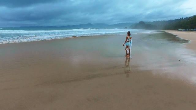 Video Reference: beach, sea, body of water, shore, ocean, coastal and oceanic landforms, wave, cloud, sky, water