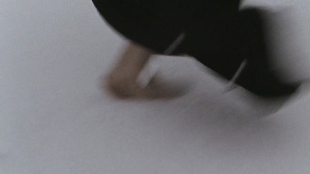 Video Reference: Footwear, Finger, Hand, Leg, Floor, Photography, Shoe, Black-and-white, Flooring, Ear