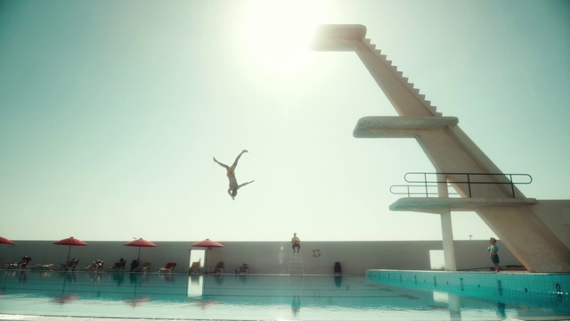 Video Reference: Sky, Swimming pool, Springboard, Cloud, Leisure, Games, Seabird, Plane, Airplane, Flying, Water, Large, People, Group, Air, Table, Sitting, Light, Jet, Standing, Bunch, Blue, Ocean, Beach, Playing, Display, White, Man, Bird, Room, Boat, Woman, Kitchen, Umbrella, Aircraft