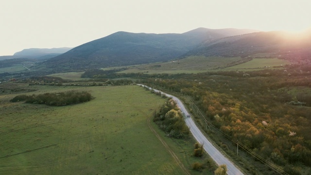 Video Reference: Highland, Mountainous landforms, Hill, Aerial photography, Mountain, Fell, Ridge, Grassland, Mountain pass, Plain