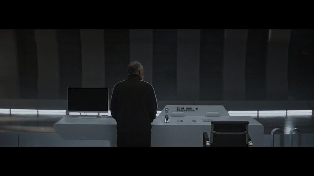 Video Reference: Screenshot, Darkness, Design, Photography, Room, Public speaking, Electronic device, Lecture, Space, Presentation, Person