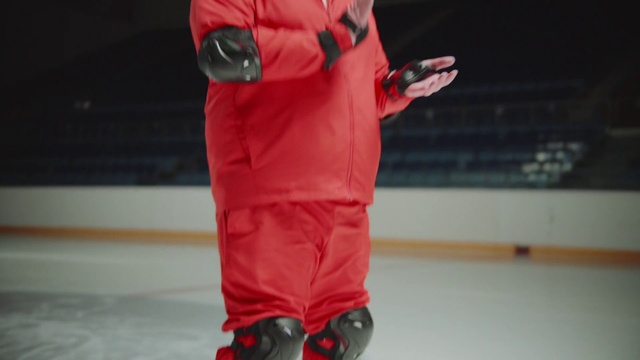 Video Reference: Red, Outerwear, Personal protective equipment, Joint, Fashion, Footwear, Jacket, Sports gear, Trousers, Recreation