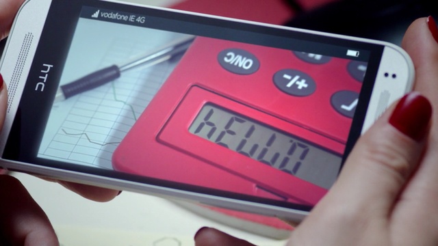 Video Reference: mobile phone, red, feature phone, gadget, electronic device, technology, communication device, portable communications device, electronics, telephony