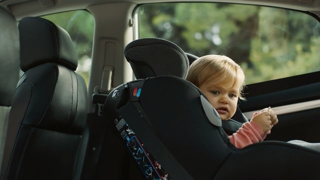 Video Reference: car, vehicle, motor vehicle, family car, car seat, driving, automotive design, vehicle door, girl, city car, Person