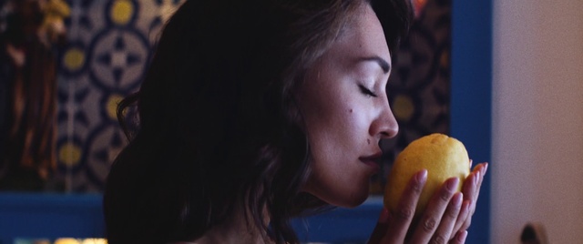 Video Reference: Face, Eating, Junk food, Yellow, Food, Neck, Fruit, Mouth, Food craving, Apple, Person