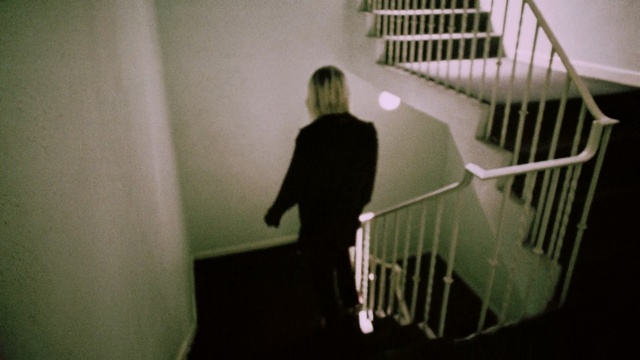 Video Reference: black, light, snapshot, darkness, shadow, angle, stairs, girl, product, Person