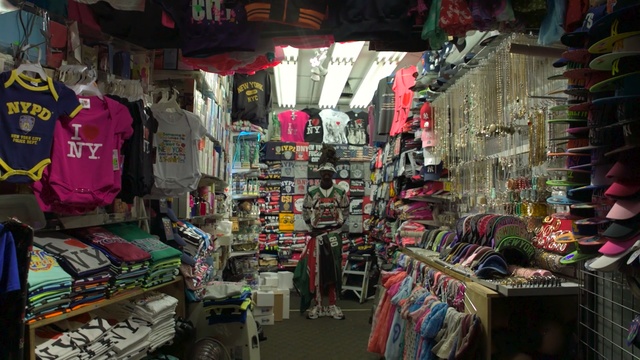 Video Reference: marketplace, market, public space, bazaar, retail, shopping, city, stall, shopkeeper, product