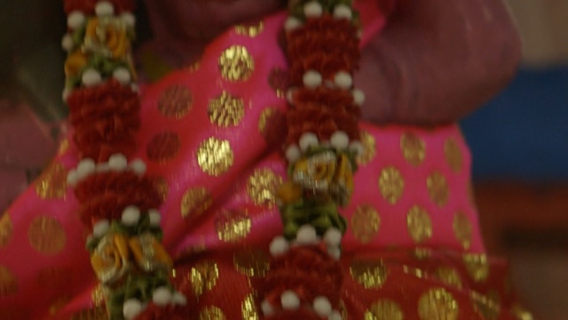 Video Reference: Maroon, Tradition, Magenta, Pattern, Design, Textile, Sari, Fashion accessory, Embroidery, Jewellery