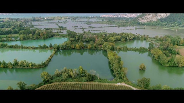 Video Reference: Water resources, Nature, Body of water, Aerial photography, Natural landscape, Water, Floodplain, Vegetation, Natural environment, Birds-eye view