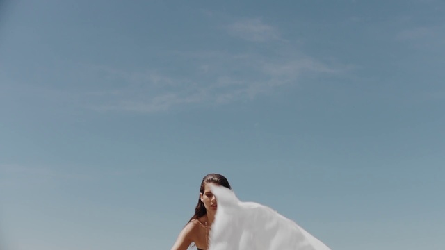 Video Reference: White, Sky, Photograph, Beauty, Cloud, Dress, Bride, Photography, Shoulder, Wedding dress