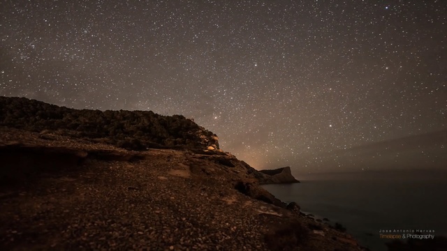 Video Reference: sky, atmosphere, night, star, geological phenomenon, astronomical object, darkness, astronomy, rock, horizon