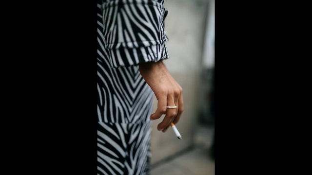 Video Reference: Street fashion, Fashion, Black-and-white, Photography, Dress, Hand, Waist, Outerwear, T-shirt, Trunk