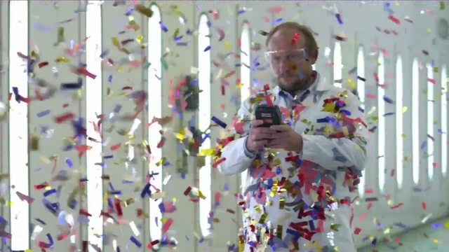 Video Reference: product, textile, play, material, recreation, fun, window, confetti, Person