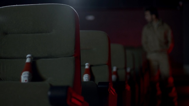 Video Reference: Red, Mode of transport, Darkness, Room, Photography, Glass, Drinkware, Cola, Carbonated soft drinks, cinema, Movie theater