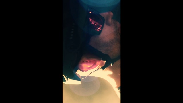 Video Reference: Nose, Ear, Mouth, Lip, Cheek, Jaw, Organ, Neck, Tooth, Photography, Dark, Light, Lit, Sitting, Photo, Front, Table, Face, Black, Red, Close, Man, Glass, Screen, Green, Phone, Holding, Computer, Standing, Traffic, White, Room, Screenshot, Text