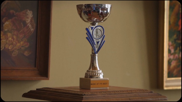 Video Reference: trophy, award, candle holder, light fixture, glass, lighting accessory, lamp