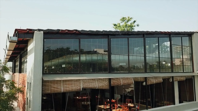 Video Reference: Building, Architecture, Property, Facade, House, Glass, Tree, Window, Commercial building, Home