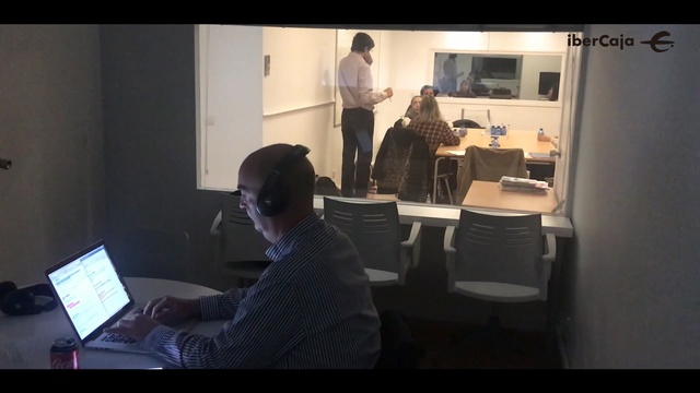 Video Reference: Job, Office, Software engineering, Presentation, Sitting, Room, Electronic device, Employment, Conversation, Furniture