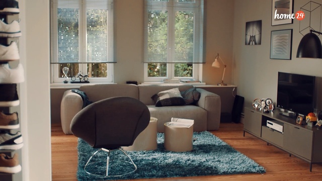Video Reference: Living room, Room, Furniture, Interior design, Property, Couch, Brown, Building, Home, Table