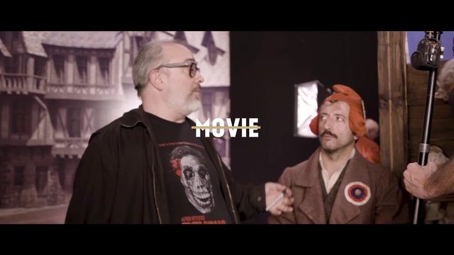 Video Reference: Snapshot, Photo caption, Movie, Fun, Screenshot, Conversation, Font, Photography, Facial hair, Jacket