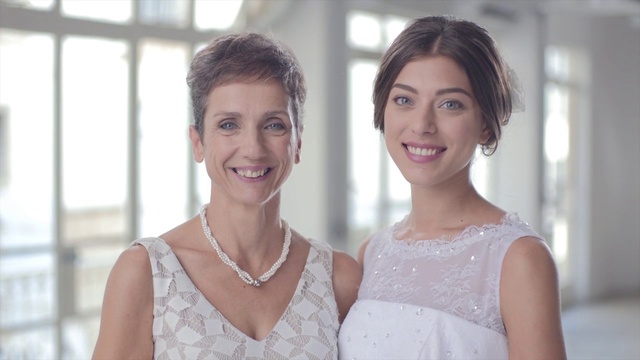 Video Reference: Hair, Photograph, Face, Skin, Beauty, Hairstyle, Dress, Smile, Bride, Wedding dress