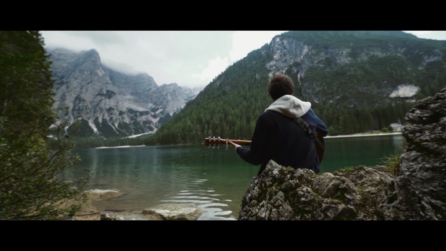 Video Reference: nature, wilderness, mountain, lake, fjord, river, highland, outdoor recreation, water, hill station, Person