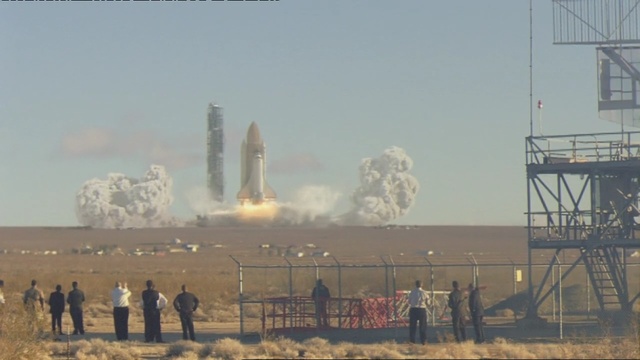 Video Reference: rocket, space shuttle, missile, spacecraft, pollution, industry, sky, spaceplane, vehicle, explosion, Person