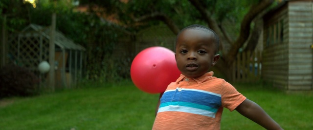 Video Reference: child, red, green, facial expression, pink, fun, grass, play, emotion, girl, Person