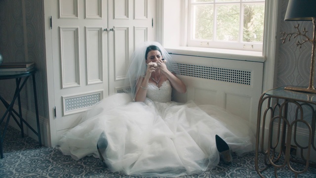 Video Reference: Bride, Photograph, Dress, Wedding dress, Gown, Clothing, Bridal clothing, Bridal party dress, Bridal accessory, Room