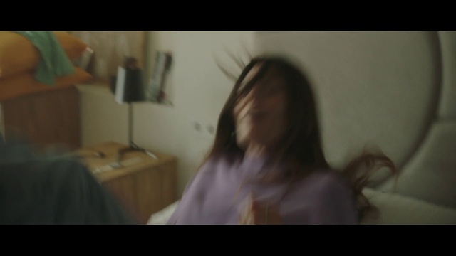 Video Reference: Hair, Face, Hairstyle, Long hair, Head, Beauty, Neck, Human, Mouth, Brown hair