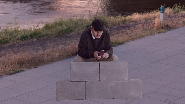 Video Reference: Plant, Road surface, Asphalt, Wall, Public space, Grass, Morning, Sidewalk, Road, Leisure