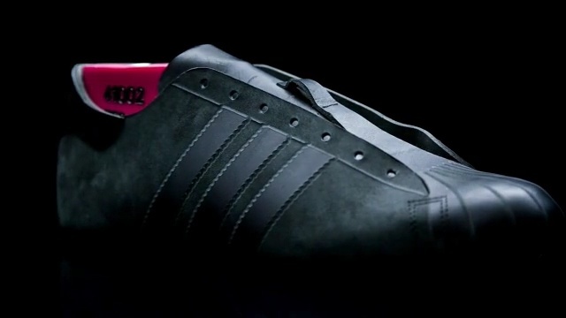 Video Reference: footwear, black, shoe, light, product, outdoor shoe, product, walking shoe, sneakers, athletic shoe, Person