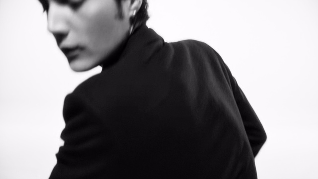 Video Reference: White, Black, Shoulder, Eyewear, Standing, Black-and-white, Neck, Photography, Model, Eye