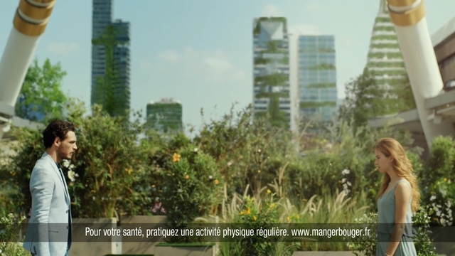 Video Reference: urban area, city, tree, plant, skyscraper, grass, recreation, metropolitan area, outdoor structure, leisure, Person
