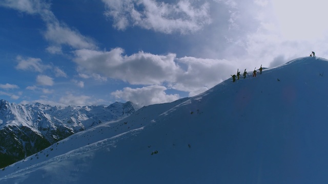 Video Reference: sky, mountain range, mountainous landforms, cloud, mountain, ridge, snow, winter, alps, geological phenomenon